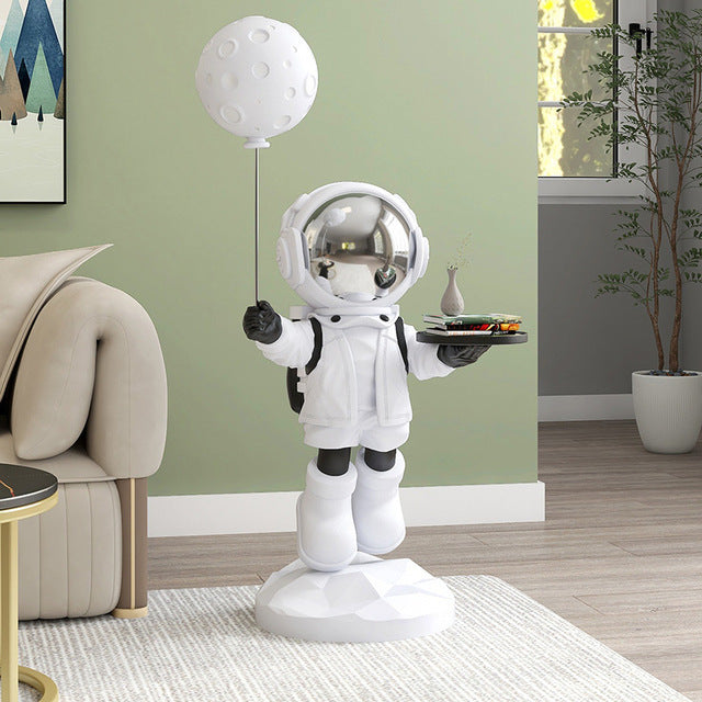 Balloon serving astronaut sculpture — white space butler decor with tray