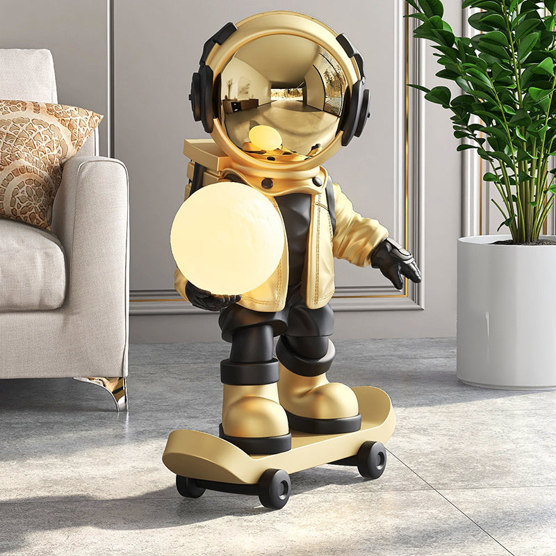 Skateboarding astronaut resin sculpture — modern living room decor