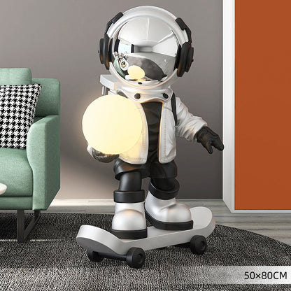 Astronaut skateboard sculpture USB light feature