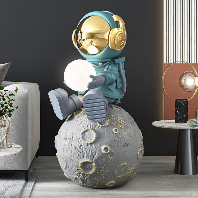 Moon astronaut XXL sculpture — teal seated large space floor decor statue with size details