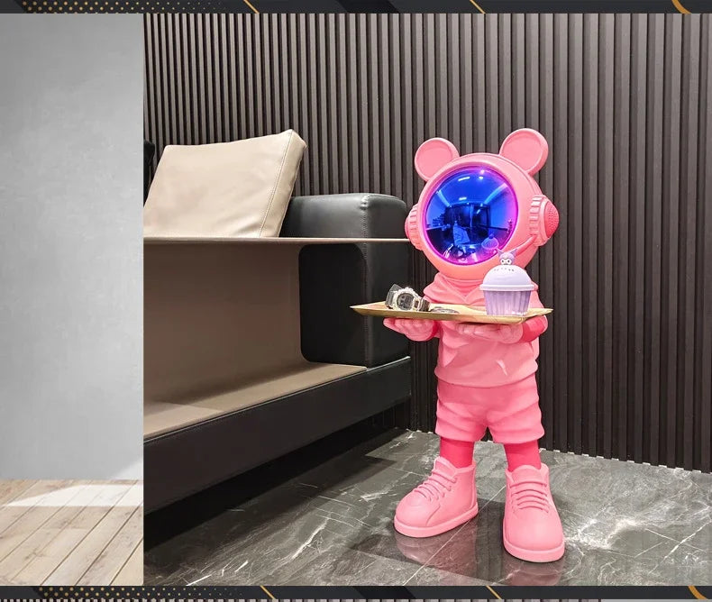 Large astronaut sculpture — pink luxury space decor figurine in living room