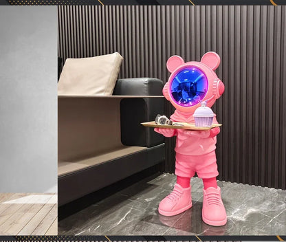 Large astronaut sculpture — pink luxury space decor figurine in living room