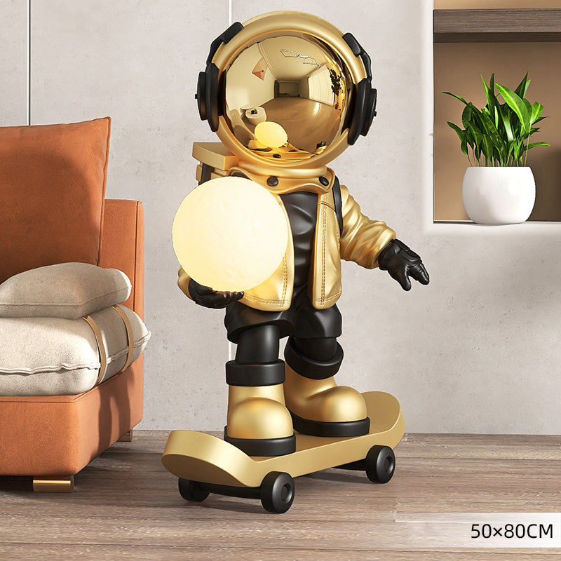 Pink astronaut skateboard sculpture modern decor figurine