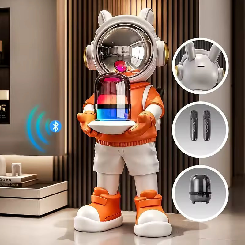 Astronaut bluetooth speaker figurine — orange jacket resin home decor