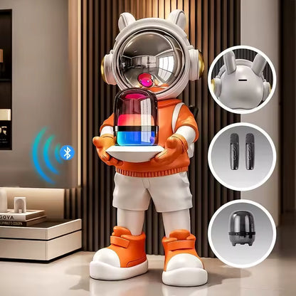 Astronaut bluetooth speaker figurine — orange jacket resin home decor