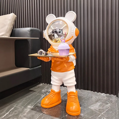 Large astronaut sculpture — orange luxury space decor figurine with cupcake tray